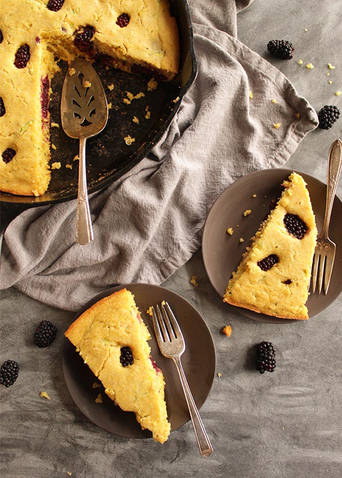 Zucchini Blackberry Cornbread (Gluten Free) - Tender sweet cornbread that's studded with juicy blackberries. The shredded zucchini replaces a lot of oil while keeping it moist. The perfect cornbread recipe for holidays and parties! Seriously the BEST cornbread I've had! (Dairy free adaptable) | robustrecipes.com