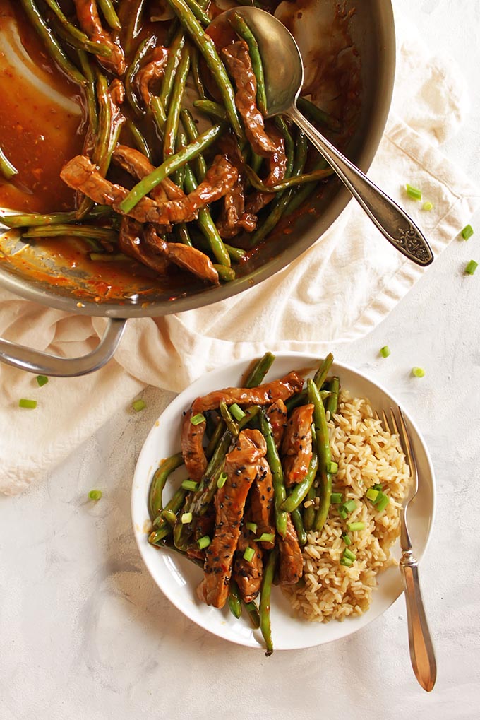 Asian Steak and Green Beans Stir Fry - Steak and green beans that are stir fried in an Asian inspired sauce. This recipe only requires 1 pan and 30 minutes to make. The perfect weeknight dinner. (Gluten free/Dairy Free) | robustrecipes.com