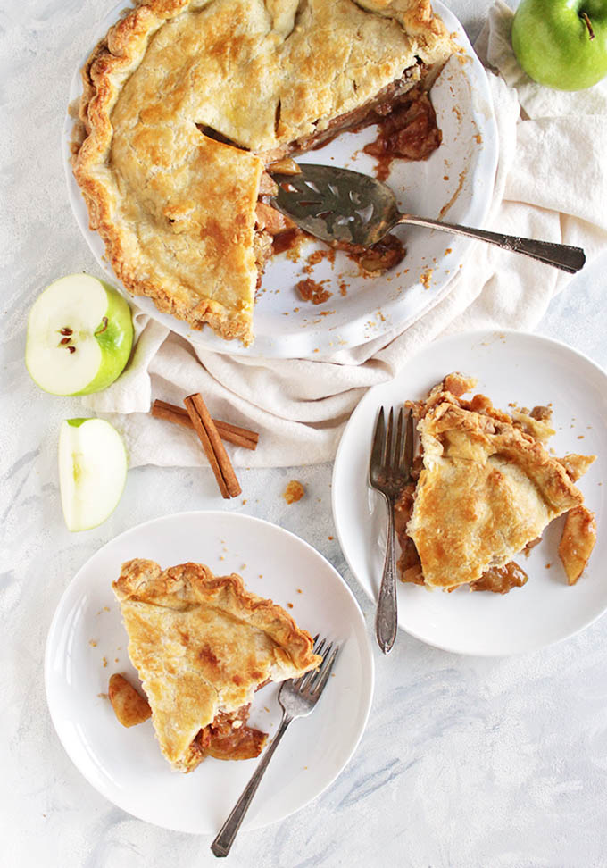 The perfect gluten free apple pie recipe! The apples are perfectly baked and the crust is flaky, buttery, and tender - no one will know it's gluten free. This pie makes a great Thanksgiving or Christmas dessert. So Yum! Also great for fall baking! | robustrecipes.com