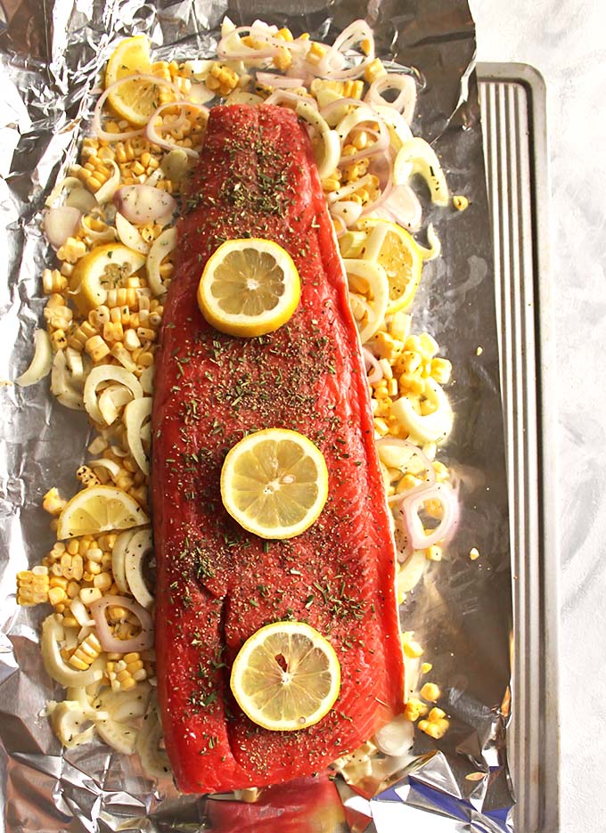 Rosemary Foil Salmon with corn and Fennel - Super easy salmon cooked in foil with corn and fennel. Only requires 30 minutes and 1 pan to make it. Perfect for a weeknight meal. Also would be great for a date night in! So yum!!! (Gluten Free/Dairy Free) | robustrecipes.com