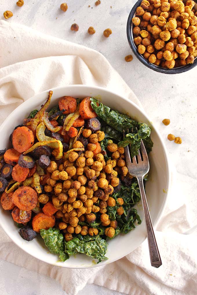 Warm Curry Salad with Crunchy Chickpeas - This salad is packed with freshly roasted veggies and crunchy chickpeas with warming curry powder and a curry tahini dressing. It's hearty, satisfying, and the perfect way to eat a ton of veggies. The perfect salad recipe for fall and winter. (Vegan & Gluten Free) | robustrecipes.com