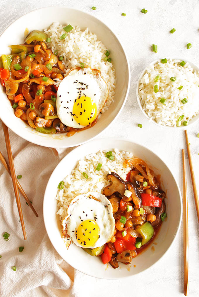 Chickpea and mushroom stir fry with fried eggs - Super veggie packed and healthy vegetarian meal that comes together in 30 minutes! That sauce + runny egg yolk is THE BEST! Perfect recipe for weeknight meals. (Gluten Free & vegetarian & dairy free) | robustrecipes.com