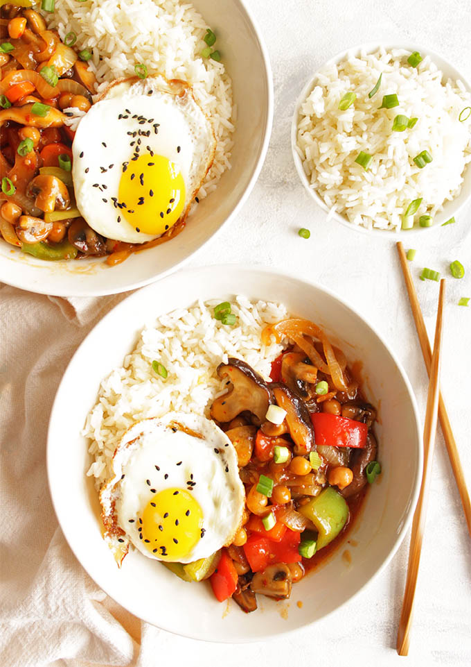 Chickpea and mushroom stir fry with fried eggs - Super veggie packed and healthy vegetarian meal that comes together in 30 minutes! That sauce + runny egg yolk is THE BEST! Perfect recipe for weeknight meals. (Gluten Free & vegetarian & dairy free) | robustrecipes.com