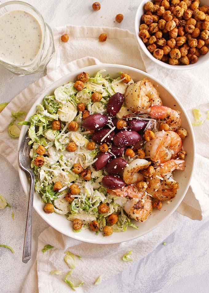 Brussels Sprouts Caesar Salad with Chickpea Croutons and Shrimp - A spin on the classic Caesar salad, with a healthier Caesar dressing and is topped which chickpea croutons and sauteed shrimp. Perfect for lunch, dinner, or even great as leftovers. (Gluten Free) | robustrecipes.com