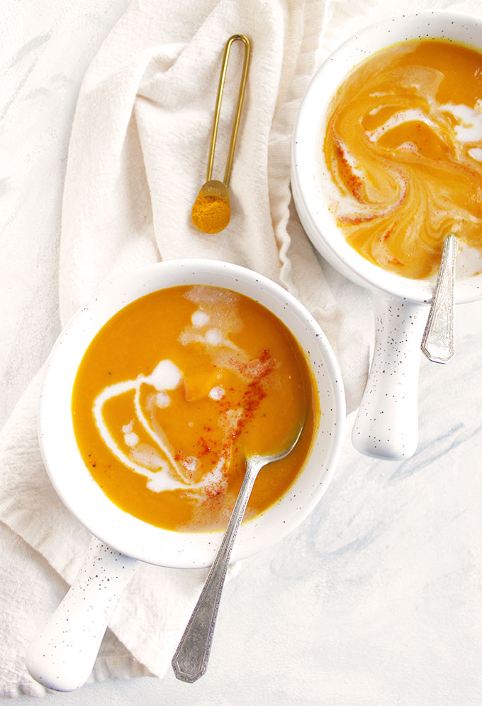 Healthy, comforting, creamy ginger turmeric carrot soup. Only takes 30 minutes to make in the Instant Pot. The perfect side dish to any meal! (Vegan/Gluten Free/Vegetarian) | robustrecipes.com