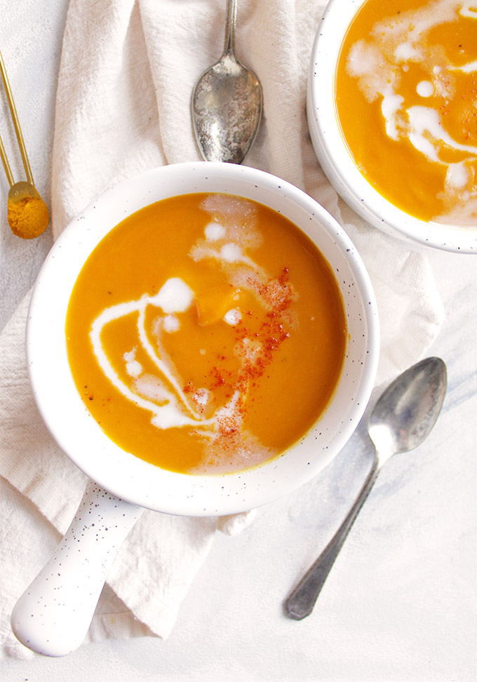 Healthy, comforting, creamy ginger turmeric carrot soup. Only takes 30 minutes to make in the Instant Pot. The perfect side dish to any meal! (Vegan/Gluten Free/Vegetarian) | robustrecipes.com