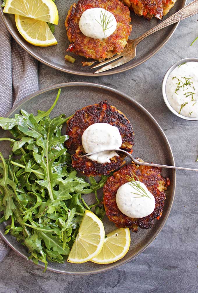 Easy Salmon Cakes with Greek Yogurt Horseradish Dip - Pantry/fridge staple salmon cakes that are perfect for a weeknight dinner, yet special enough to serve to guests. This recipe only takes 40 minutes to make and is gluten free! One of my favorite go-to meals! | robustrecipes.com