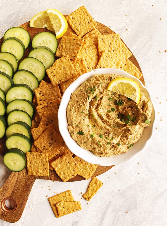 Roasted Baba Ganoush is a creamy Middle Eastern dip made from roasted Eggplants. This method is easy to make - no need to drain the eggplant. Serve with crackers, or pita chips for in intriguing dip that's perfect for any party or as an appetizer to any meal! Gluten Free | robustrecipes.com