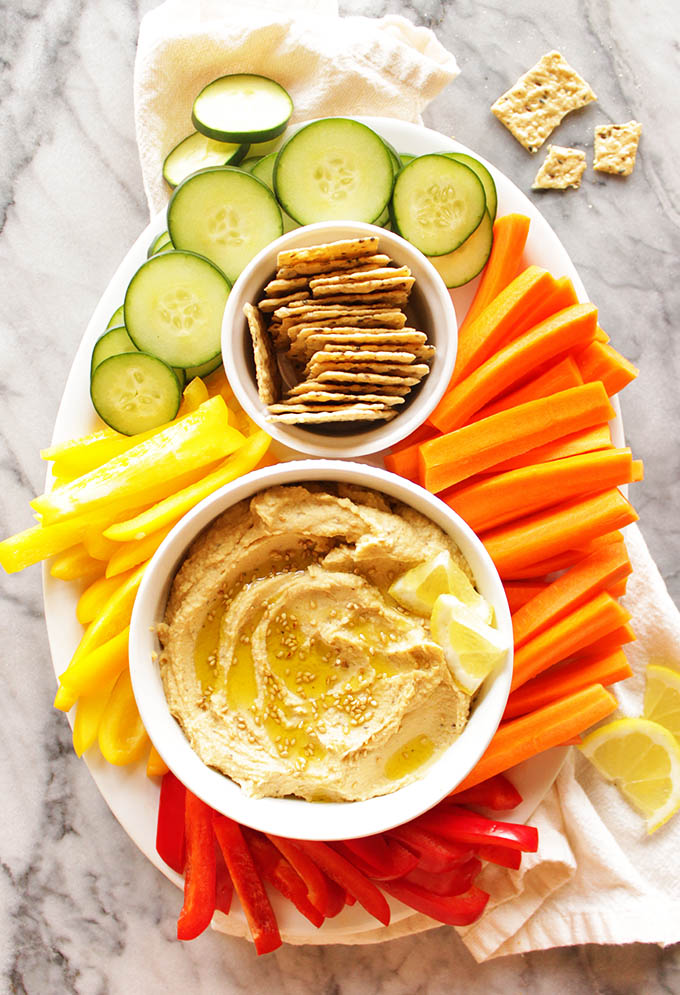 My Go To Hummus - This simple hummus recipe is perfect for dipping with veggies or crackers for a healthy appetizer, side, or snack. It only takes 10 minutes to make and uses simple pantry ingredients. It's rich, creamy, and super healthy. #hummus #glutenfree #vegan #easyrecipe | robustrecipes.com