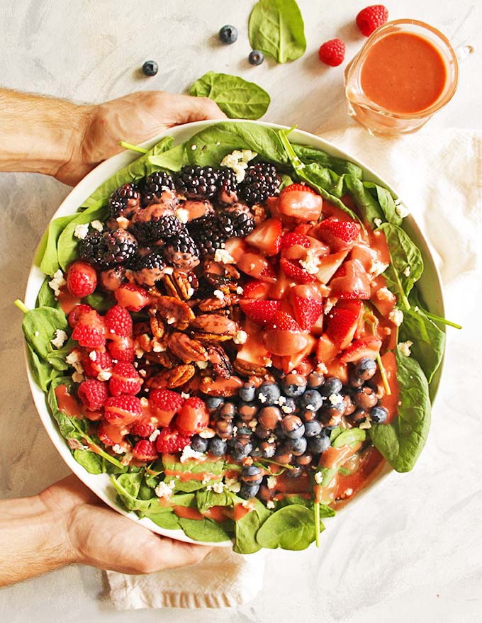  Berry Spinach Salad with Raspberry Vinaigrette - loaded with berries, candied maple pecans, honey goat cheese, & homemade raspberry vinaigrette. The ultimate summer salad recipe! #Salad #berries #summer #vegetarian #glutenfree #vegan | robustrecipes.com