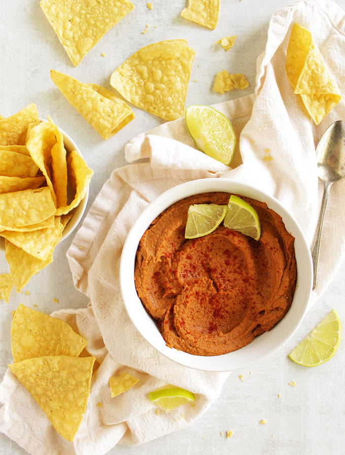 Spicy Chipotle Black Bean Hummus - a spicy, smoky hummus that's perfect for lunch or any party. Serve it with tortilla chips or cucumbers. Only takes 10 minutes to make! #hummus #easyrecipe #recipe #lunch #glutenfree #vegan #vegetarian #dairyfree