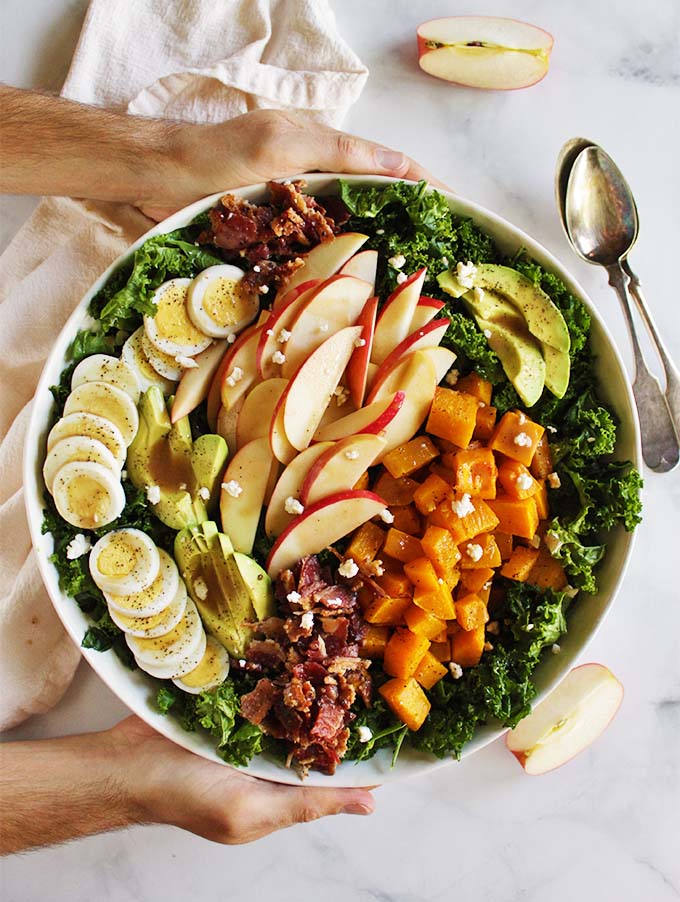 Fall Cobb Salad with Butternut Squash - loaded with fall produce such as roasted butternut squash and crunchy apples. It still has a lot of the classics: avocado, hard boiled eggs, and bacon. This is a great entree salad! #fall #recipes #glutenfree #cleaneating | robustrecipes.com