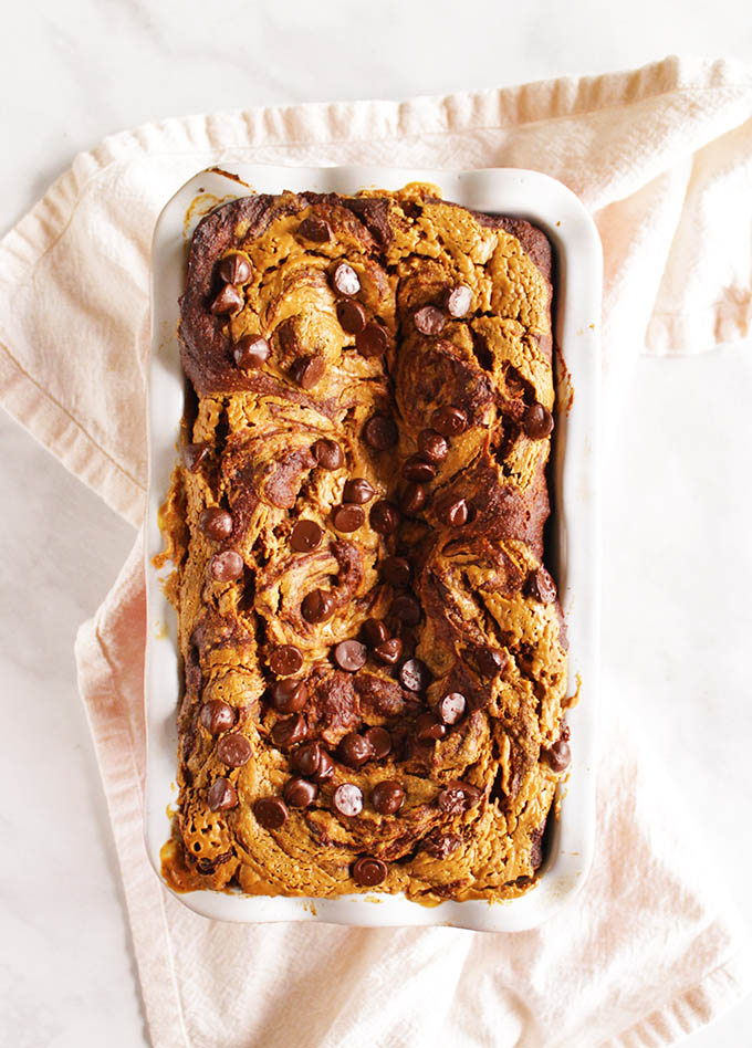  Peanut Butter Swirl Banana Bread with Chocolate Chips - everything we love about banana bread with a touch of decadence from the swirled peanut butter and dark chocolate chips. Gluten free and perfect for any occasion. #bananabread #peanutbutter #glutenfree #chocolate | robustrecipes.com