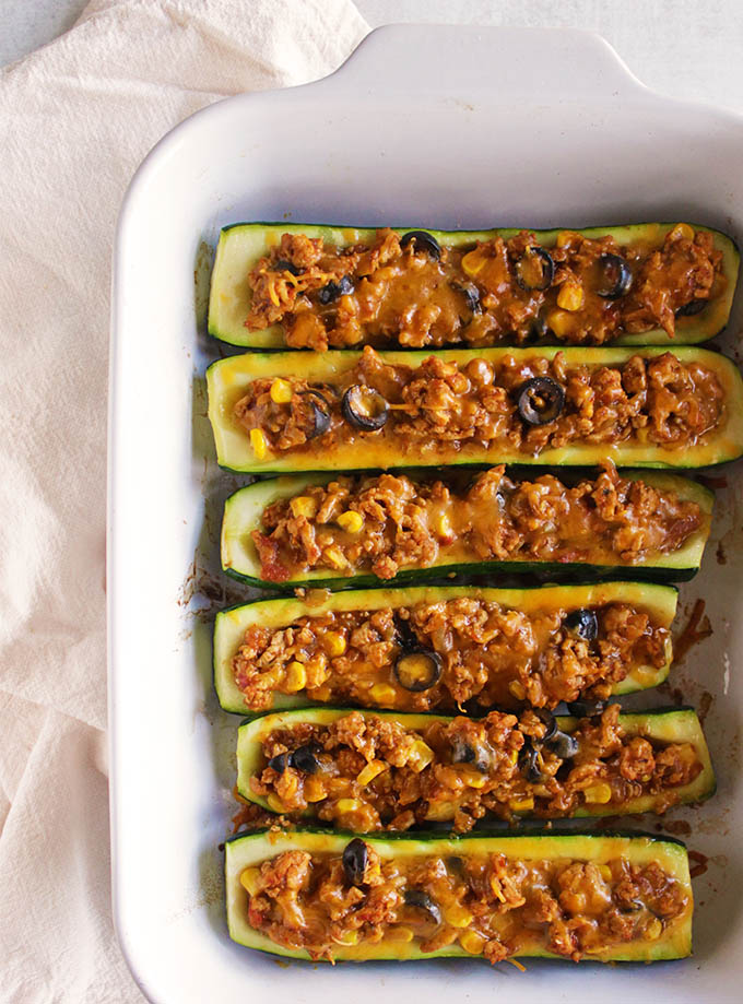 Taco Stuffed Zucchini Boats - all the taco flavors stuffed into a zucchini. This balanced, veggie packed meal is perfect for a weeknight or a make-ahead dinner. #easyrecipes #glutenfree #tacos #healthyfood | robustrecipes.com