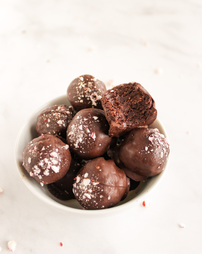 Healthy Dark Chocolate Peppermint Truffles -  the perfect dessert for the holidays.  They're packed with healthier ingredients but still taste indulgent. So good! #vegan #glutenfree #dairyfree #easyrecipe #chocolate