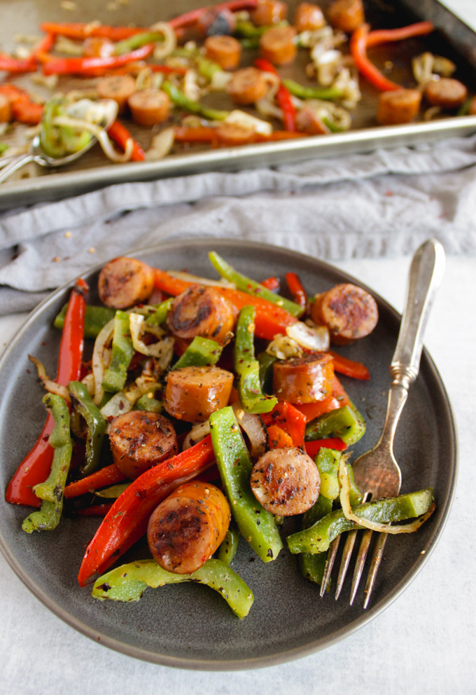 Sheet Pan Italian sausage and peppers (20 minutes) - is a super easy and healthy dinner that's perfect for any weeknight. Clean ingredients, only 20 minutes, and one pan. #healthyfood #easyrecipes #cleaneating #chicken #glutenfree | robustrecipes.com