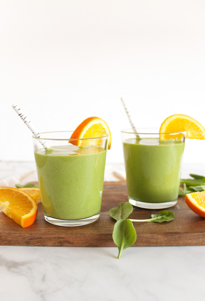 Immune Boosting Orange Green Smoothie - packed with immune boosting vitamins, minerals, and nutrients. Bursting with orange flavor, creamy and delicious! Only Takes 10 minutes to make! #smoothie #easyrecipe #smoothierecipe #glutenfree #healthyrecipe #vegan | robustrecipes.com