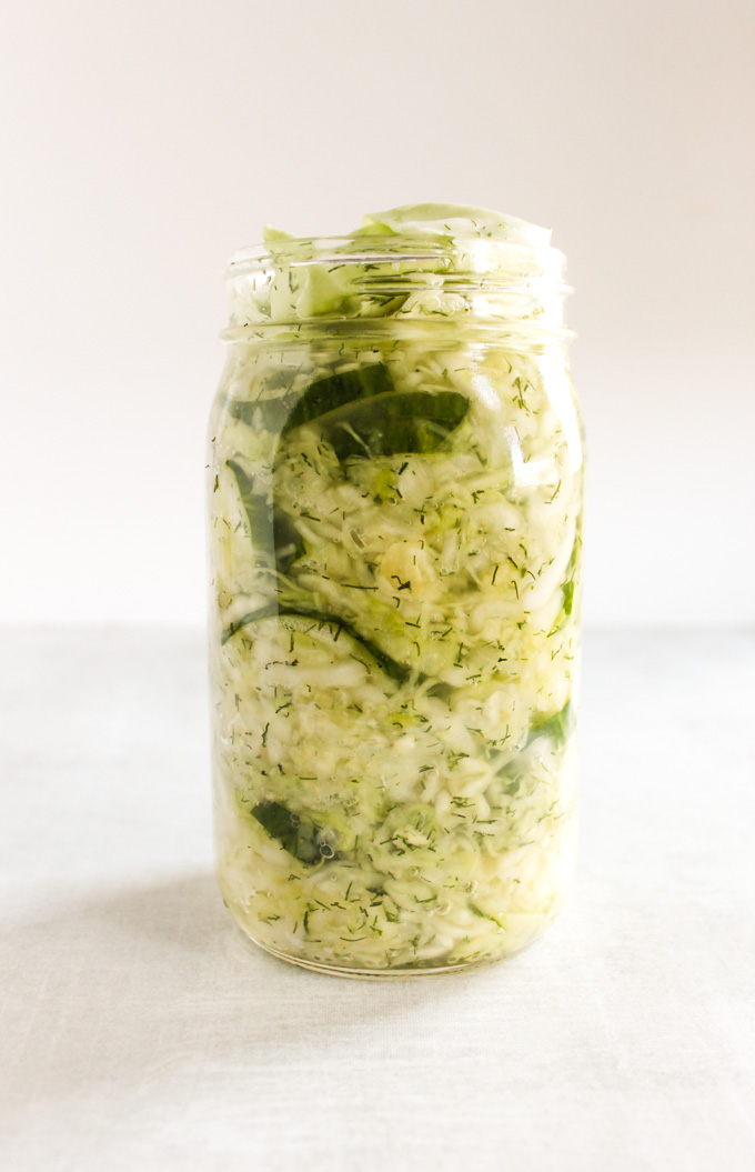 2 Healthy sauerkraut recipes - garlic dill pickle sauerkraut & carrot ginger lemon sauerkraut. Easy method for making fermented sauerkraut with gut health probiotics. #vegan #glutenfree #probiotics #easyrecipe | robustrecipes.com