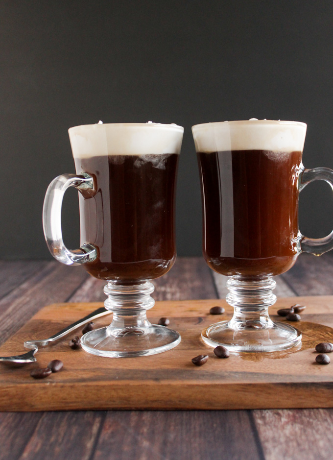  Easy Coconut Irish Coffee - An easier twist on the classic Irish coffee. Coconut Irish coffee has a layer of whipped coconut cream that effortlessly floats on top of whiskey spiked coffee. The perfect cocktail to enjoy for St. Patrick's day! #vegan #cocktail #glutenfree #easyrecipe #stpatricksday #coffee | robustrecipes.com
