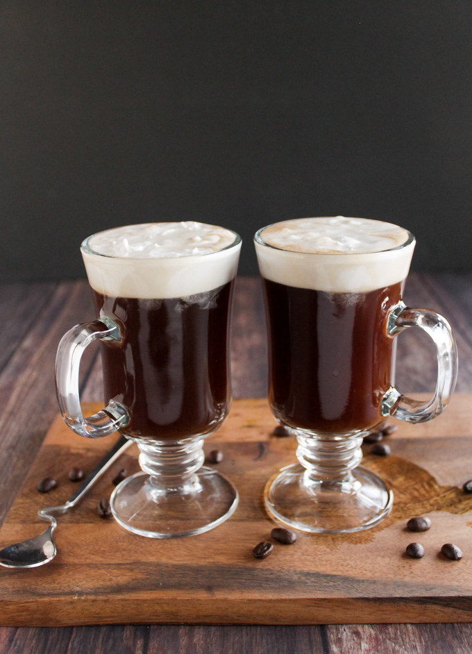 Easy Coconut Irish Coffee - An easier twist on the classic Irish coffee. Coconut Irish coffee has a layer of whipped coconut cream that effortlessly floats on top of whiskey spiked coffee. The perfect cocktail to enjoy for St. Patrick's day! #vegan #cocktail #glutenfree #easyrecipe #stpatricksday #coffee | robustrecipes.com