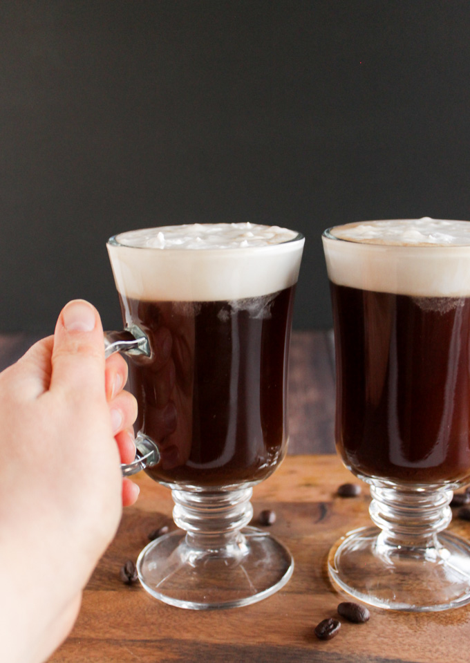 Easy Coconut Irish Coffee - An easier twist on the classic Irish coffee. Coconut Irish coffee has a layer of whipped coconut cream that effortlessly floats on top of whiskey spiked coffee. The perfect cocktail to enjoy for St. Patrick's day! #vegan #cocktail #glutenfree #easyrecipe #stpatricksday #coffee | robustrecipes.com