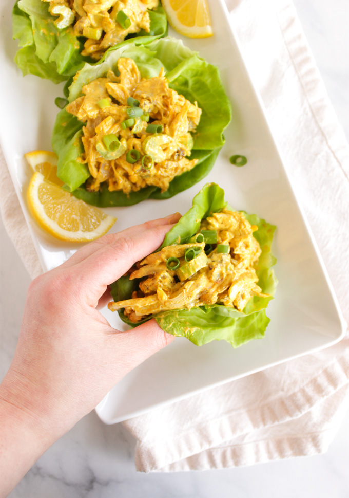 10 Minute Curry Chicken Salad - Curry chicken salad is perfect for parties or even a make ahead lunches. Chicken is in a creamy curry sauce with sweet raisins, crunchy celery, and crunchy almonds. Perfect for meal prepping. #chicken #curry #easyrecipe #lunchrecipes #mealprep #glutenfree | robustrecipes.com
