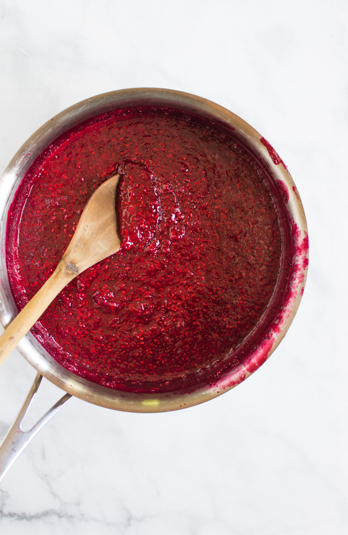 3 Ingredient Raspberry Chia Jam - super easy to make, only takes 10 minutes. It's naturally sweetened and great for spreading on toast, PB&J sandwiches, baking, and so much more! #vegan #easyrecipe #jam #chiaseeds #glutenfree #raspberries #honey #maplesyrup #springrecipe #onepanrecipe #healthy | robustrecipes.com