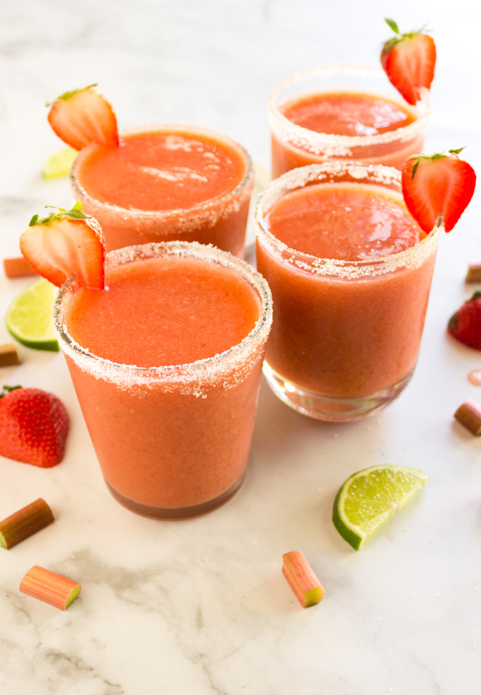 Frozen Strawberry Rhubarb Margaritas - the perfect balance of sweet and tart with plenty of fruitiness. The ultimate refreshing margarita for a hot spring day. #margartias #rhubarb #strawberries #tequila #cocktails #margartiarecipe #spring #agavenectar #glutenfree #vegan #vegetarian | robustrecipes.com