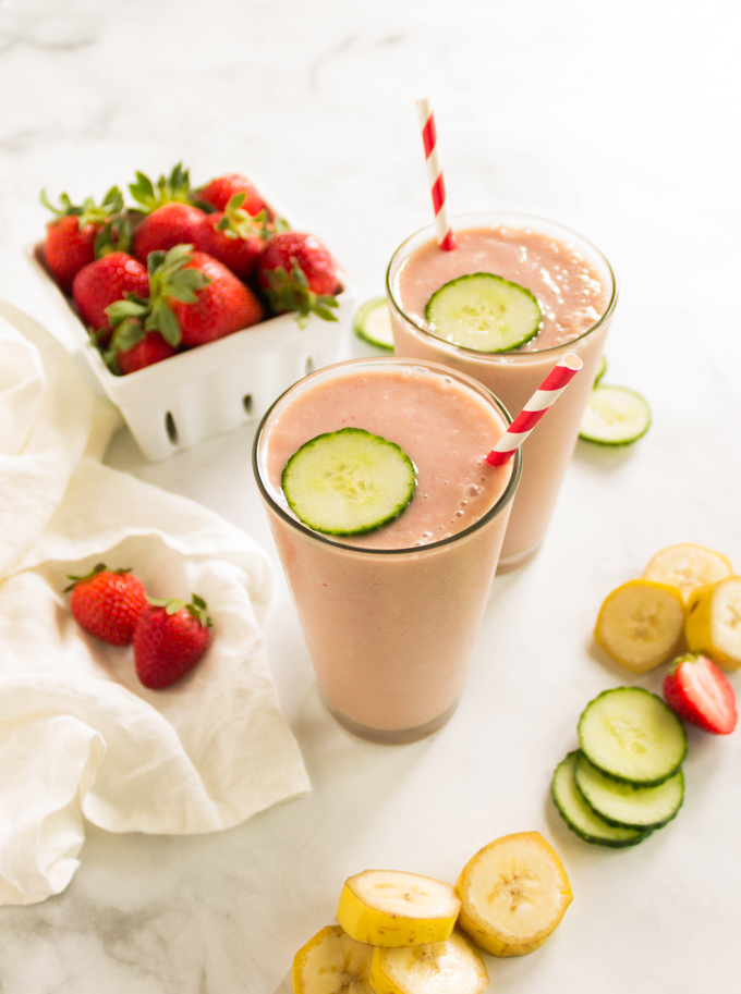 Strawberry banana cucumber smoothie is packed with nutritious ingredients. The cucumber adds a refreshing summer twist. There is plenty of sweetness from the banana and strawberries. #smoothie #glutenfree #easyrecipe #healthy #cleanfood #vegan #dairyfree #plantbased #bananas #cucumbers #strawberries #healthyrecipe #summer | robustrecipes.com