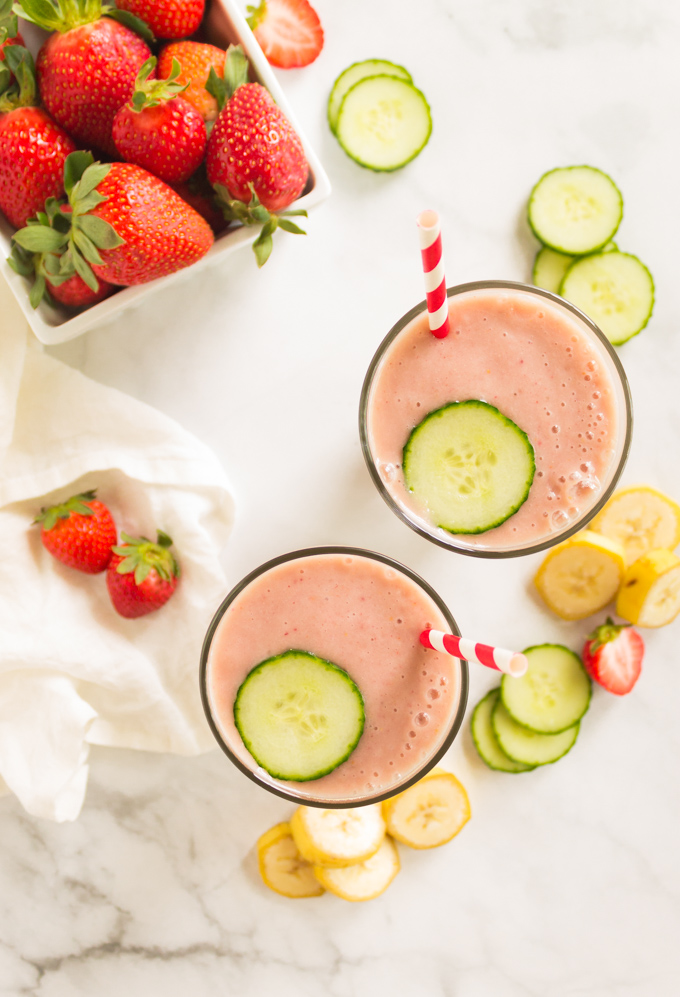 Strawberry banana cucumber smoothie is packed with nutritious ingredients. The cucumber adds a refreshing summer twist. There is plenty of sweetness from the banana and strawberries. #smoothie #glutenfree #easyrecipe #healthy #cleanfood #vegan #dairyfree #plantbased #bananas #cucumbers #strawberries #healthyrecipe #summer | robustrecipes.com