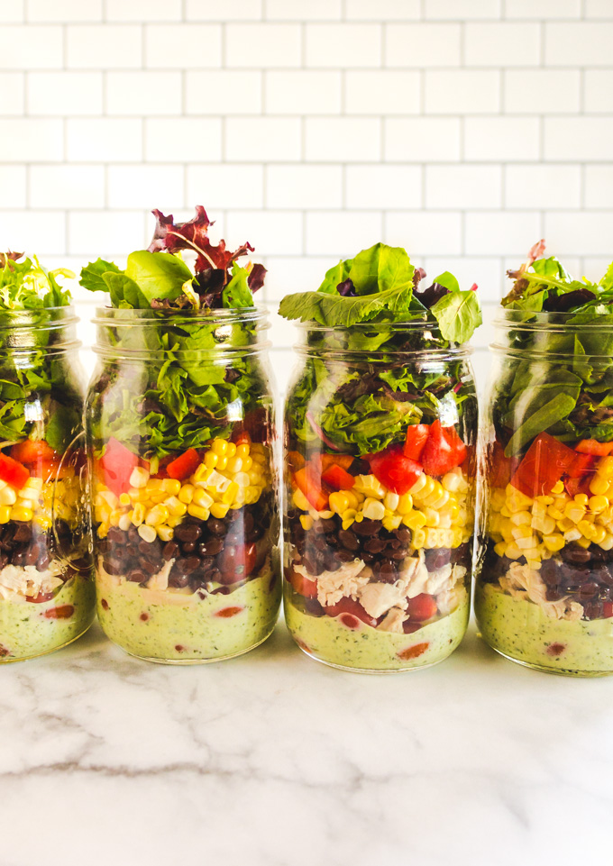Mexican Salads in a Jar with Healthy Ranch Dressing - packed with all the Mexican veggies. Perfect for meal prep. They stay fresh for 4 days, great for packed lunches or picnics. Packed with all the Mexican veggies. #salads #mealprep #chicken #summer #easyrecipe #lunch #packedlunch #worklunch #healthy #saladsinajar #masonjarsalads #ranchdressing #greekyogurt #jalapeno #entree #corn | robustrecipes.com