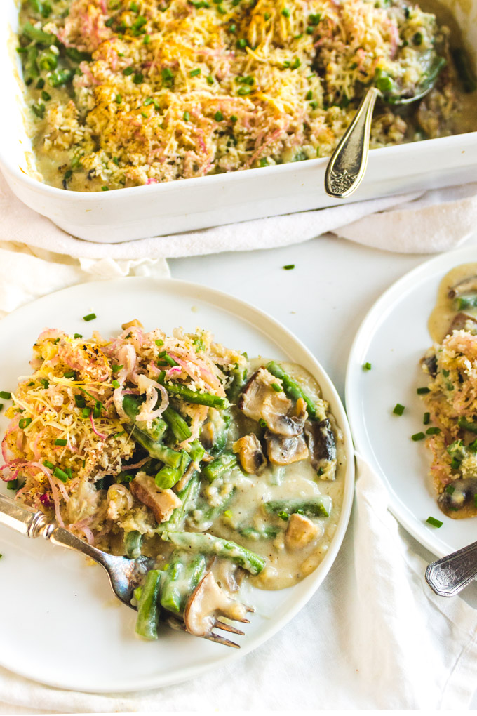 Homemade green bean casserole made with fresh green beans and a red onion crispy topping. This is the perfect side dish to any Thanksgiving feast, or any other holiday. #glutenfree #vegetarian #greenbeancasserole #sidedish #thanksgiving #thanksgiving recipe #mushrooms #greenbeans | robustrecipes.com