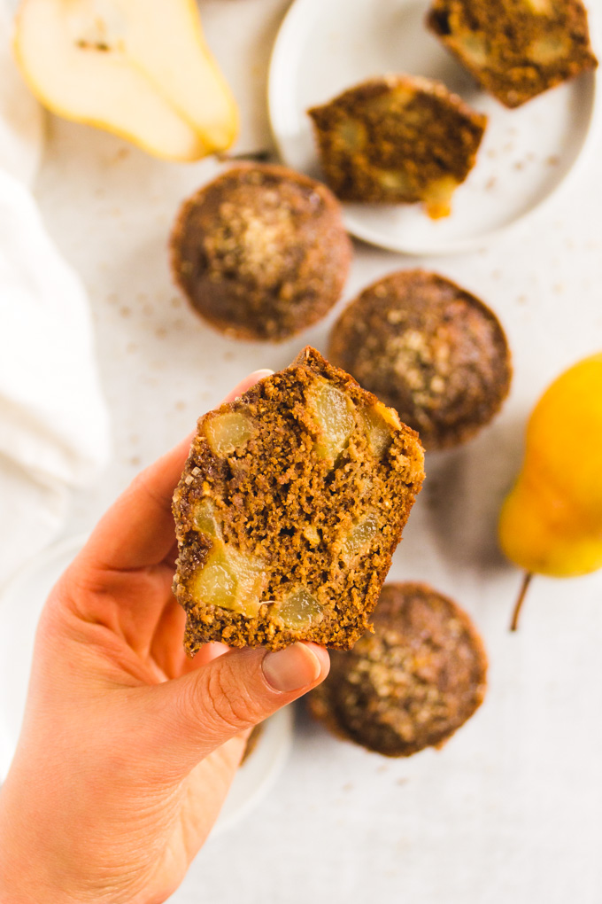 Gingerbread pear muffins are packed with warming spices, sweet molasses, and studded with juicy ripe pears. They are the perfect muffin for the Holidays. They are made gluten free by using oat flour and coconut flour. #glutenfree #muffins #glutenfreemuffins #pear #molasses #oats #coconutflour #baking #holidayrecipe #christamsrecipe #breakfast #snack #holidaymuffin #christmasmuffin #dairyfree | robustrecipes.com
