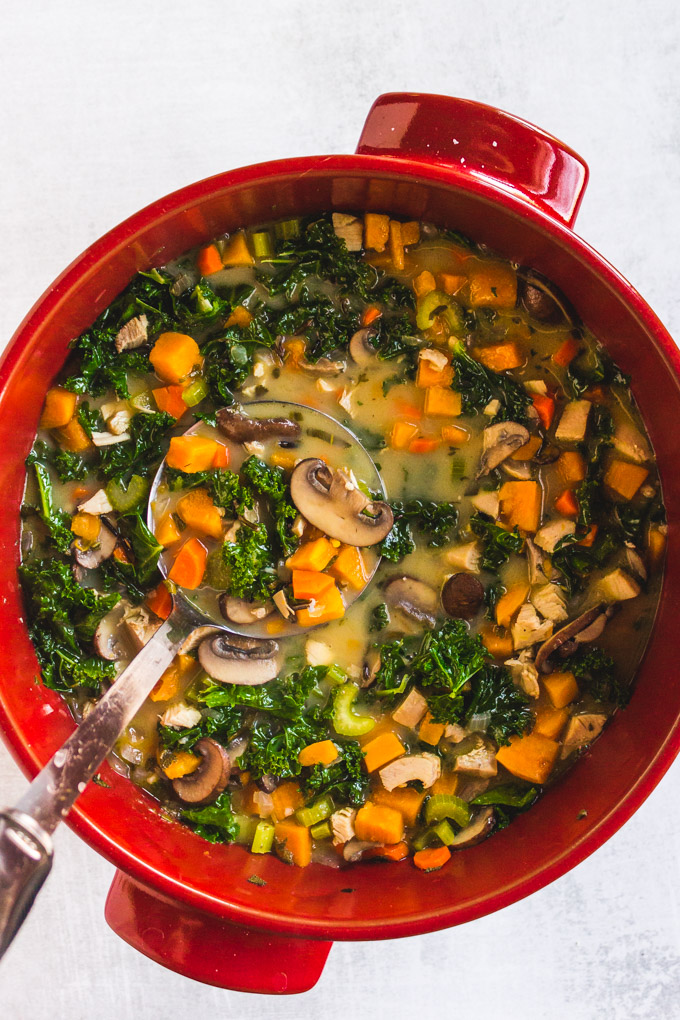 Wild Rice Sweet Potato Soup (with Leftover Thanksgiving Turkey) - the perfect way to use up leftover Thanksgiving turkey. It's packed with fall veggies that makes it a nutritious meal. #thanksgivingturkey #leftovers #mealprep #soup #turkey #sweetpotato #mushrooms #kale #superfoods #healthy #easy #entree #dairyfree #coconutmilk #glutenfree #wildrice | robustrecipes.com