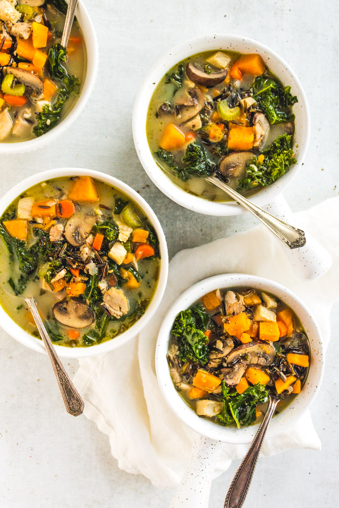 Wild Rice Sweet Potato Soup (with Leftover Thanksgiving Turkey) - the perfect way to use up leftover Thanksgiving turkey. It's packed with fall veggies that makes it a nutritious meal. #thanksgivingturkey #leftovers #mealprep #soup #turkey #sweetpotato #mushrooms #kale #superfoods #healthy #easy #entree #dairyfree #coconutmilk #glutenfree #wildrice | robustrecipes.com