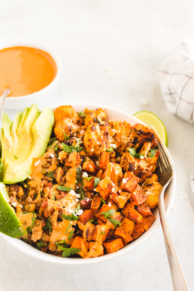 Chipotle Lentil Sweet Potato Buddha Bowl - Packed with healthy ingredients that are bursting with flavor, lentil sweet potato buddha bowl is the perfect vegan entree any day of the week.  Only takes 40 minutes to make! #veganmeal #buddhabowl #glutenfreerecipe #lentils #weeknightdinner #dairyfree | RobustRecipes.com
