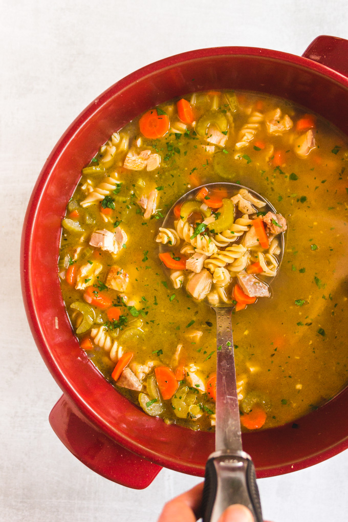 The Best Chicken Noodle Soup - packed with flavor so that you will want to enjoy it for any meal, not just when you're sick. Healing and warming, perfect anytime you need a comforting meal. #glutenfreerecipe #glutenfreesoup #glutenfreenoodles #chickennoodlesoup #healthysoup #chickenrecipe | robustrecipes.com