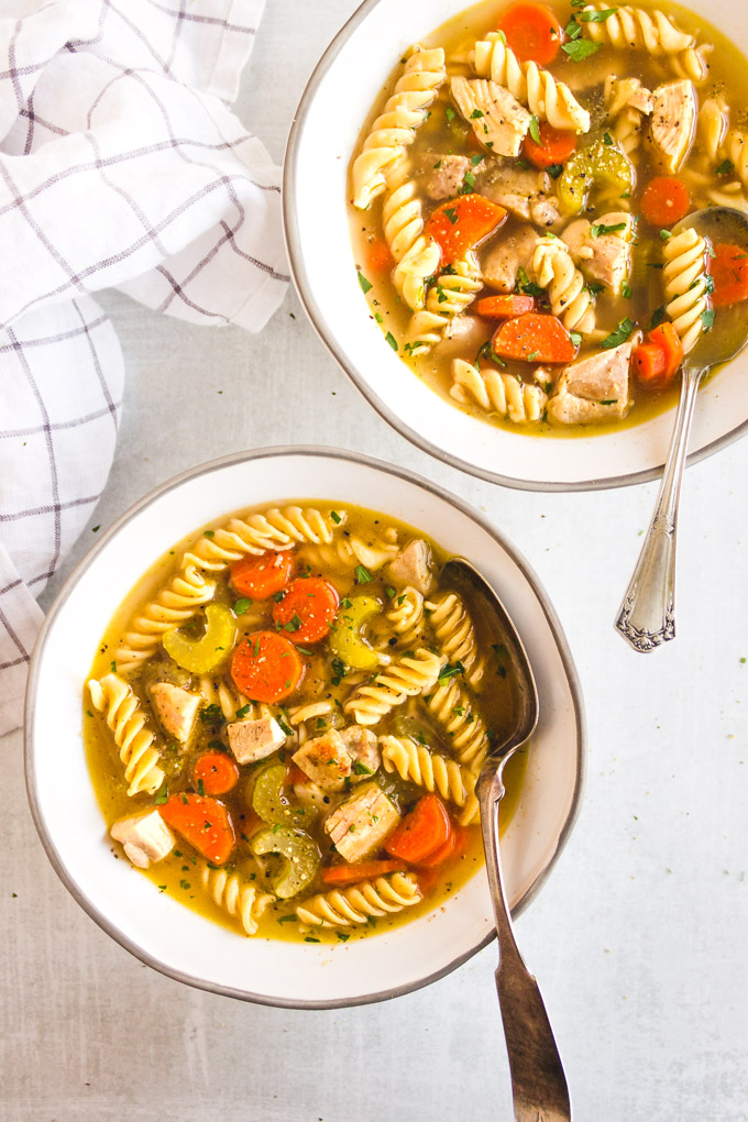 The Best Chicken Noodle Soup - packed with flavor so that you will want to enjoy it for any meal, not just when you're sick. Healing and warming, perfect anytime you need a comforting meal. #glutenfreerecipe #glutenfreesoup #glutenfreenoodles #chickennoodlesoup #healthysoup #chickenrecipe | robustrecipes.com