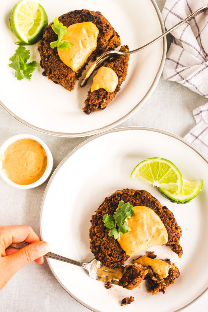 Easy Chipotle Black Bean Burgers - crispy on the outside and tender with a hint of smoky flavor on the inside. These burgers are easy to make and uses simple ingredients. They are the perfect vegan or meatless meal. #blackbeanburger #veggieburger #meatlessmeal #meatlessmonday #veganrecipe #glutenfreerecipe #blackbeans #easyrecipe | robustrecipes.com