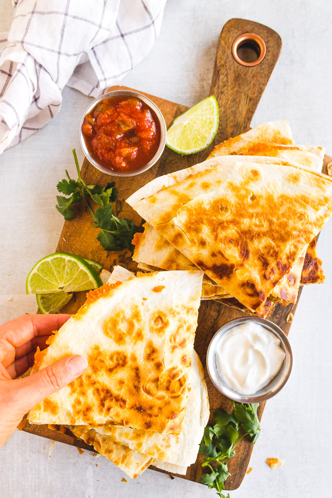 Lentil quesadillas (great for meal prep) - the perfect meatless meal that's packed with protein. Make the filling and have it on hand all week  so that you can make a quesadilla in 10 minutes. A hearty meal that uses pantry and fridge staples. #pantrystaples #vegetarianquesadillas #glutenfreerecipe #cincodemayo #mexicanrecipes #quesadillas #lentils #quinoa #cheese #mealpreprecipe #mealprep #easyrecipe | robustrecipes.com