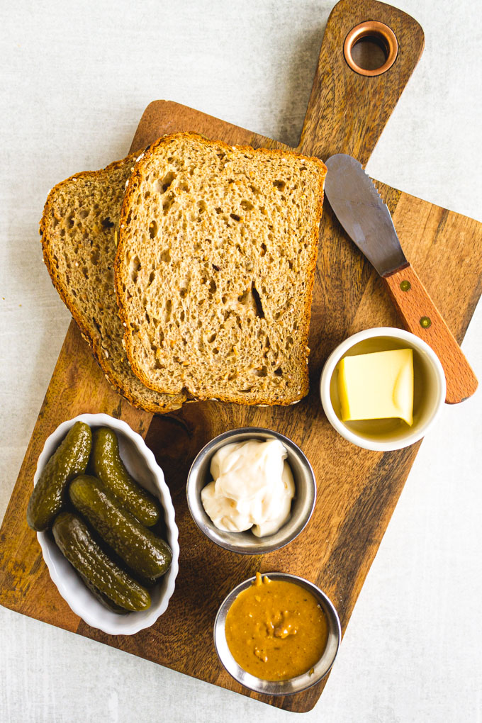 Grilled Peanut Butter Sweet Pickle Sandwich - an odd combo that totally works 15 minutes to make, requires a few fridge & pantry staples you likely have on hand. Let this sandwich surprise you! #pantrystaples #sandwichrecipe #peanutbutter #glutenfreerecipe #pickles #easyrecipe #lunchrecipe | robustrecipes.com