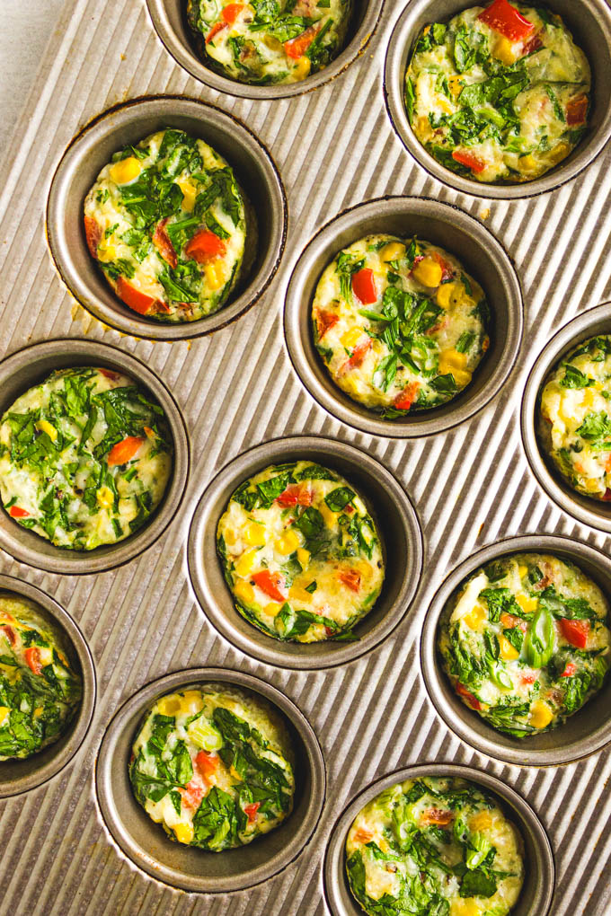 Healthy Egg White Muffin Cups - Easy the perfect easy meal prep recipe to make weekdays easier. Packed with protein, a hint of cheese, and veggies, these muffin cups will keep you satisfied until lunch. #breakfast #mealprep #eggs #eggwhites #glutenfreerecipe #vegetarianrecipe #mealprepbreakfast #healthyrecipe | robustrecipes.com