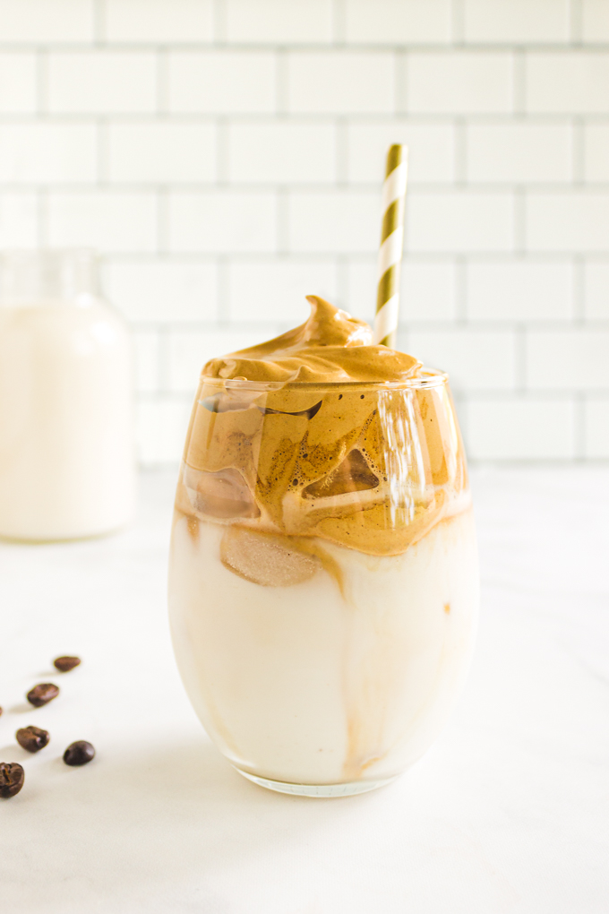 The Best Whipped Coffee (AKA Dalgona Coffee) -made with a few simple ingredients to create a thick, creamy whipped coffee that is spooned over milk. This recipe uses just a few more ingredients to create the ultimate whipped coffee. #whippedcoffee #dalgonacoffee #coffeerecipe #milk #drink #icedcoffee #glutenfree #vegan #dairyfree | robustrecipes.com