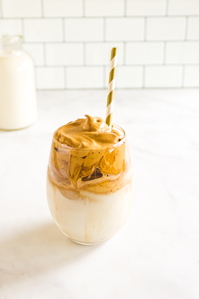 The Best Whipped Coffee (AKA Dalgona Coffee) -made with a few simple ingredients to create a thick, creamy whipped coffee that is spooned over milk. This recipe uses just a few more ingredients to create the ultimate whipped coffee. #whippedcoffee #dalgonacoffee #coffeerecipe #milk #drink #icedcoffee #glutenfree #vegan #dairyfree | robustrecipes.com