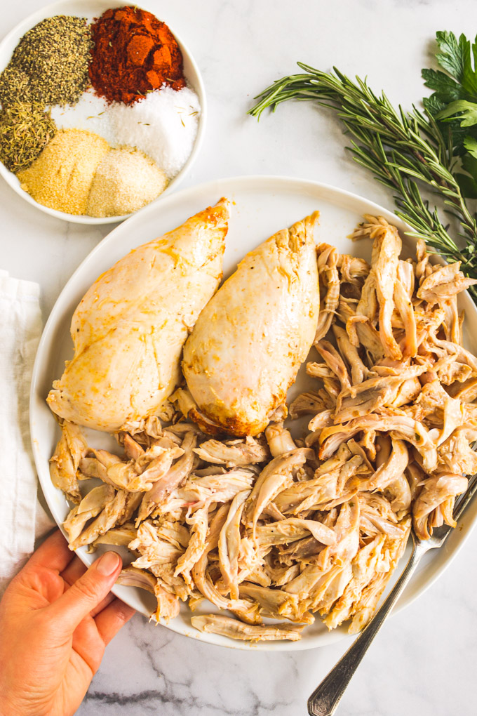 Instant Pot Whole Chicken - The perfect recipe for meal prep. You can cook a whole chicken in 50 minutes. You will have juicy, delicious pre-cooked chicken in your fridge, waiting to be used in a variety of recipes all week long. #wholechicken #instantpotrecipes #chickenrecipes #mealpreprecipes #glutenfreerecipe #dairyfreerecipe #chickenrecipes #pressurecooker | robustrecipes.com