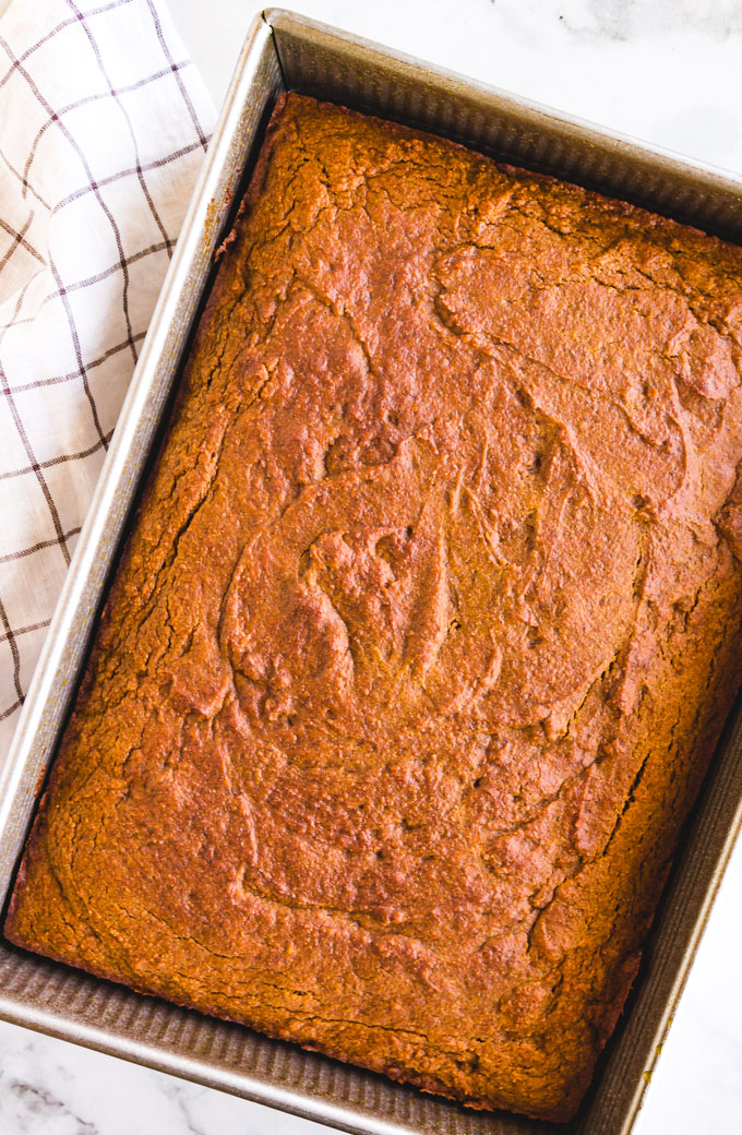 Pumpkin cake freshly baked, still in it's 9x13 pan, without frosting.