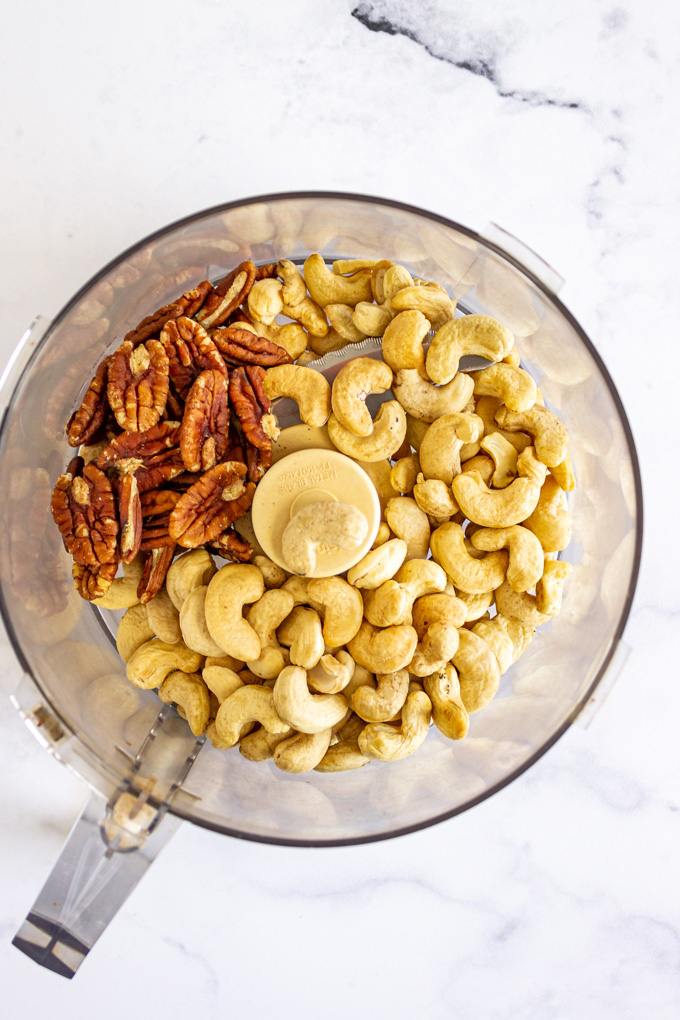 cashews and pecans in a food processor.