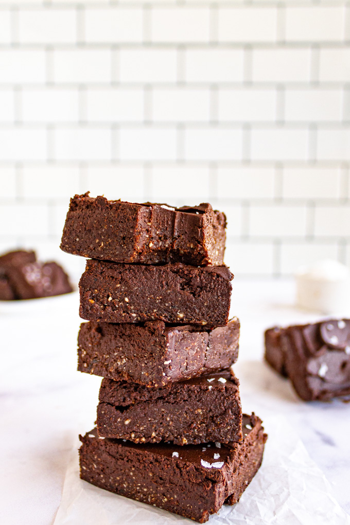 A stack of no bake brownies with a white background.