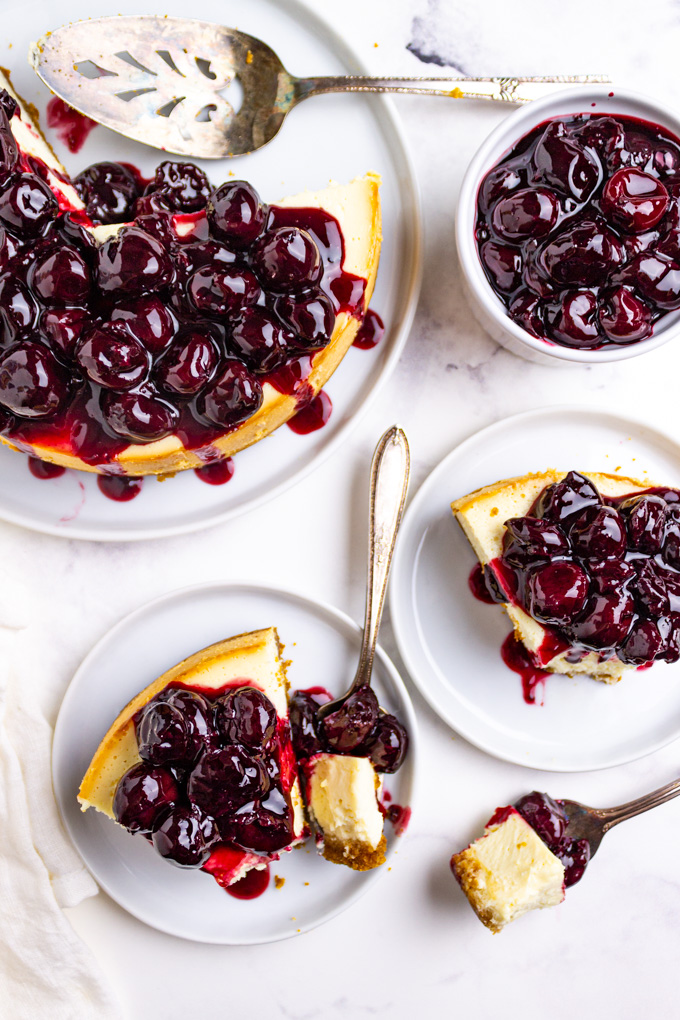 overhead shot of instant pot cheesecake with cherry topping.